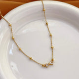Rhinestone bow necklace