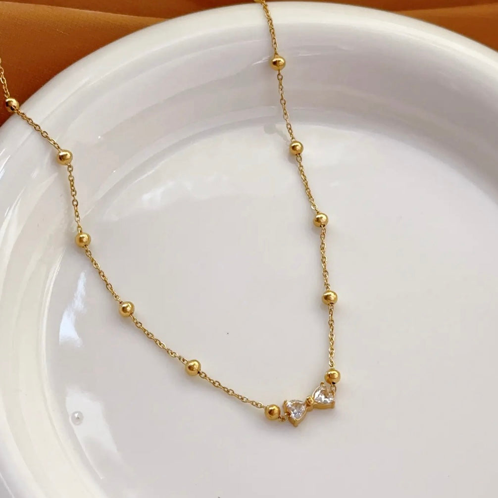 Rhinestone bow necklace