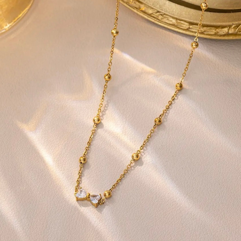 Rhinestone bow necklace