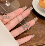 Minimal silver bow chain